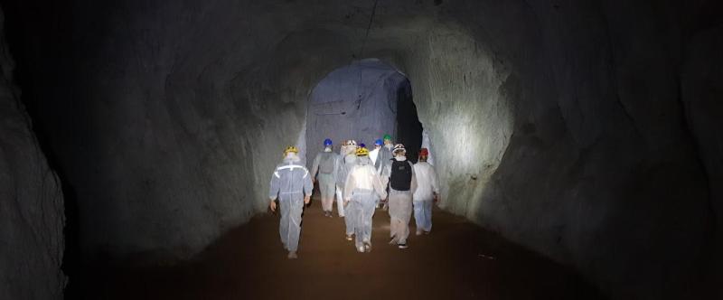 Group of explorers in the undergrounds
