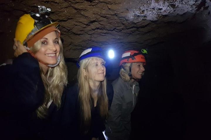 Three girls with lights in the undergrounds