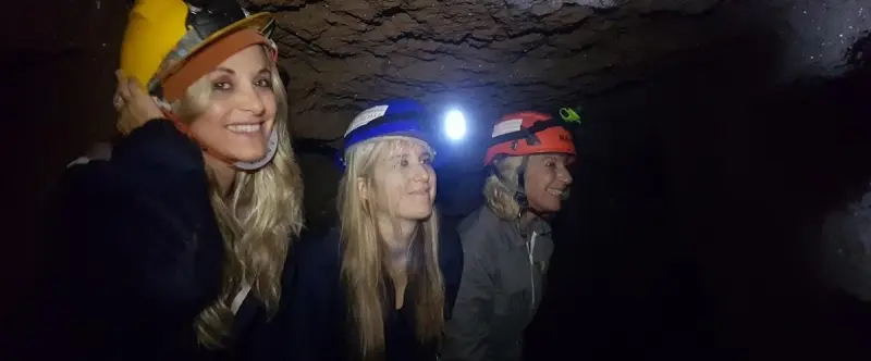 Three girls with lights in the undergrounds