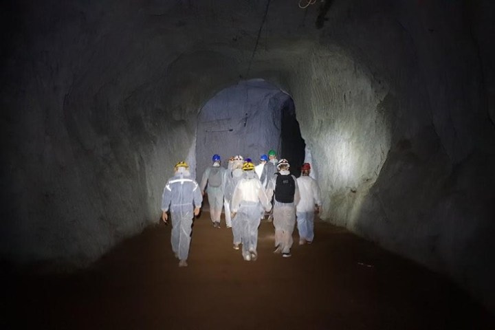 a person standing in a dark room