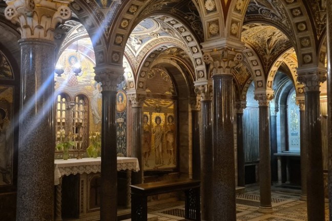 a statue in front of a building
