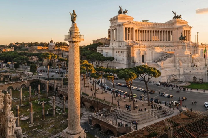 a group of people standing in front of a building